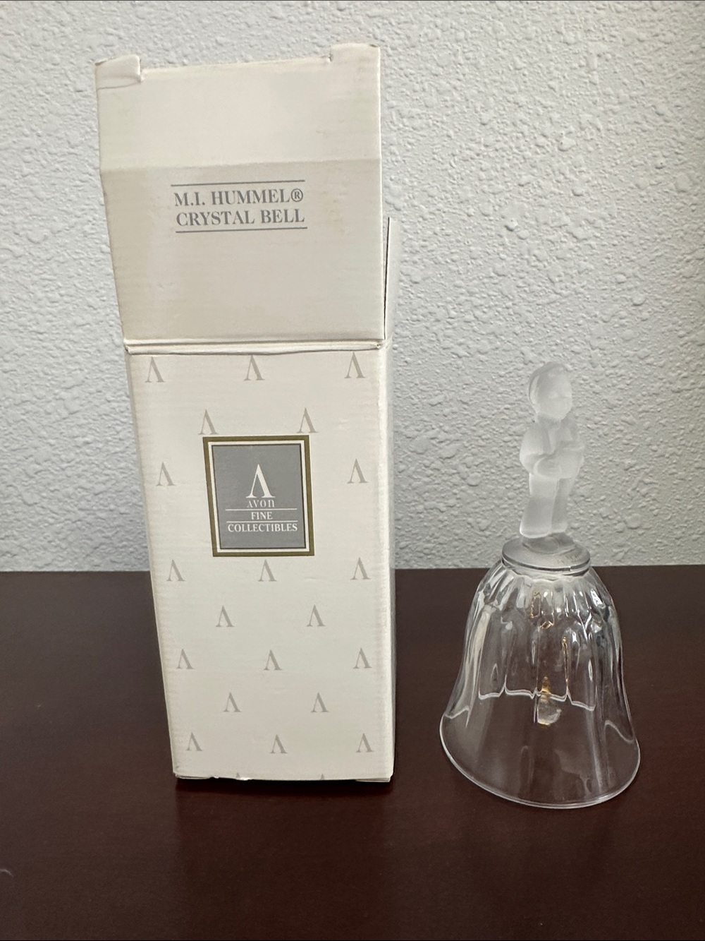 Avon Clear Crystal Bell with Frosted Hummel Figure